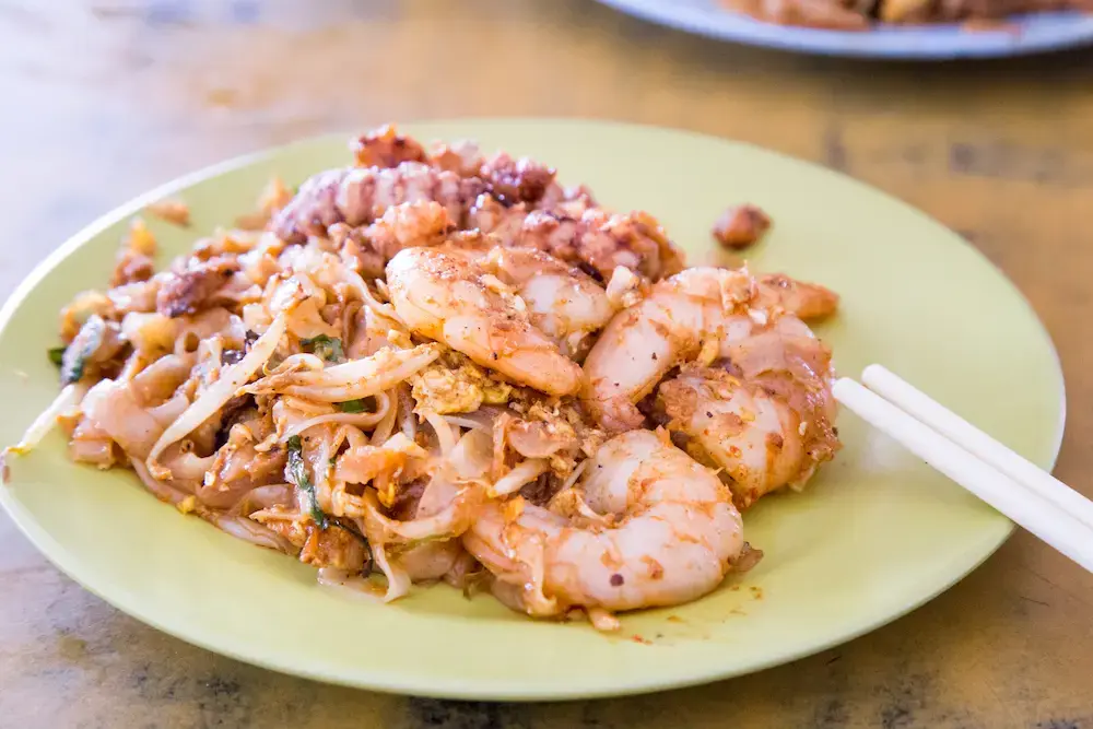 close up on popular penang char kuey teow or fried noodles