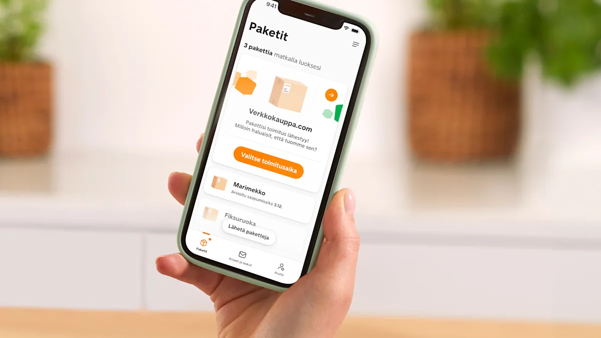 A phone displaying the OmaPosti app.