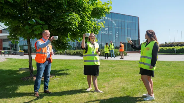 Employees from Paulig, Transval and Neste together in a picture.