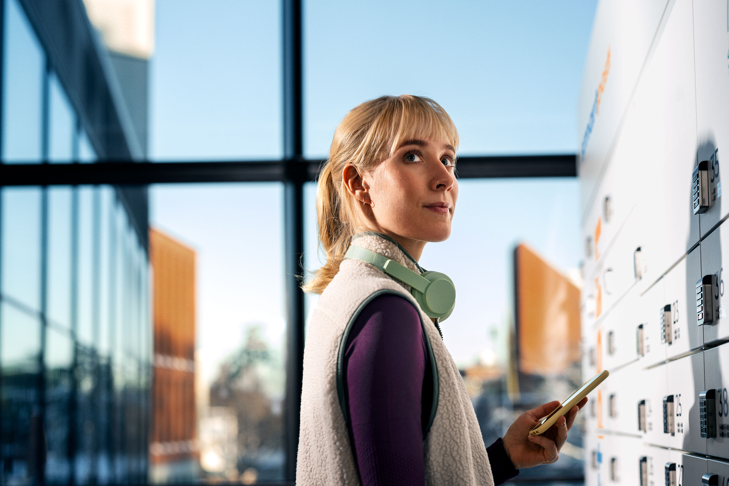 A woman at a SmartPosti locker.