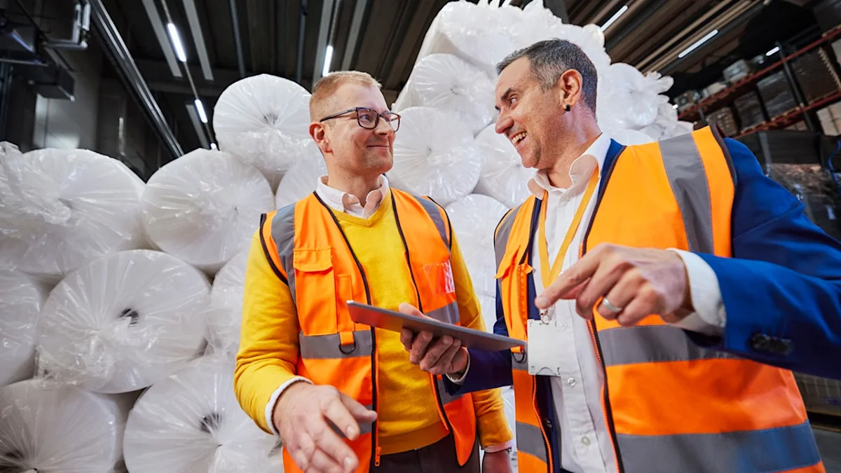 Two men working on inhouse logistics