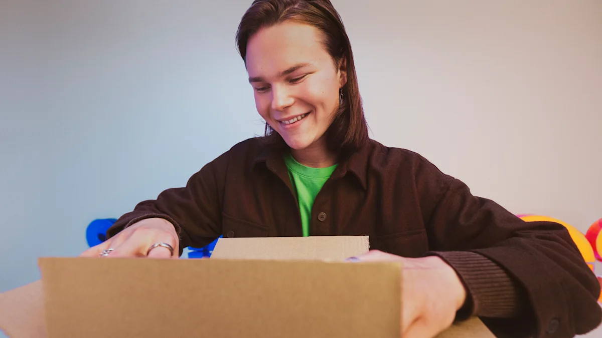 A woman looking into a cardboard box.