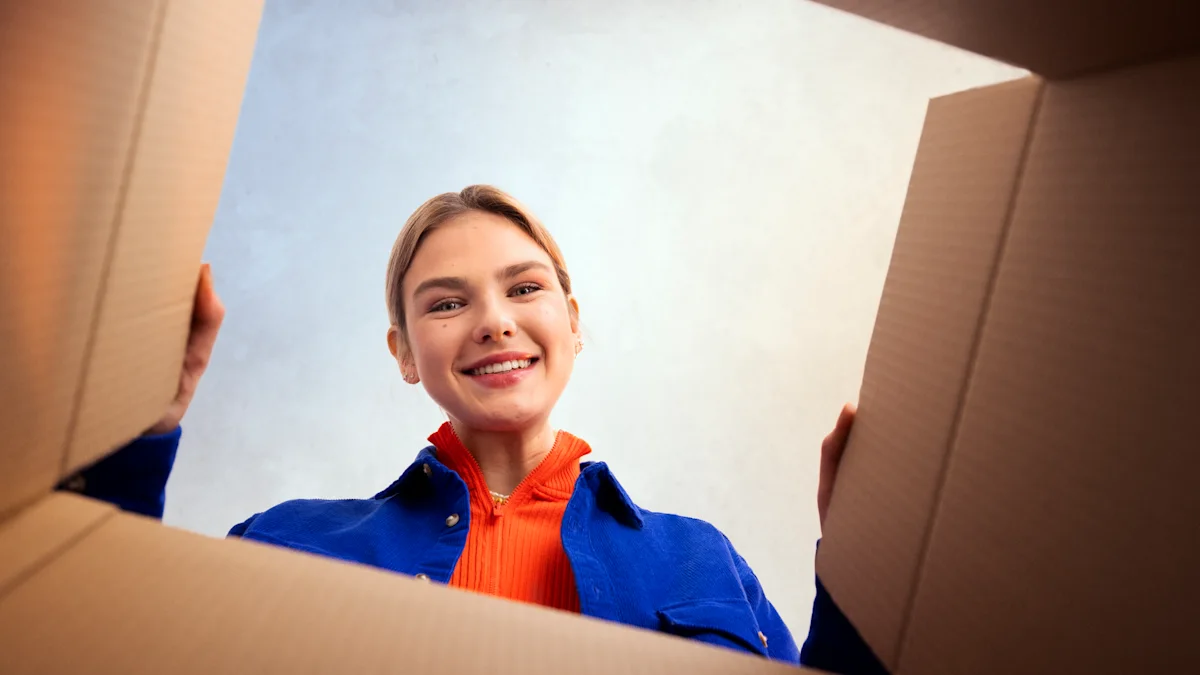 A woman looking into a cardboard box.