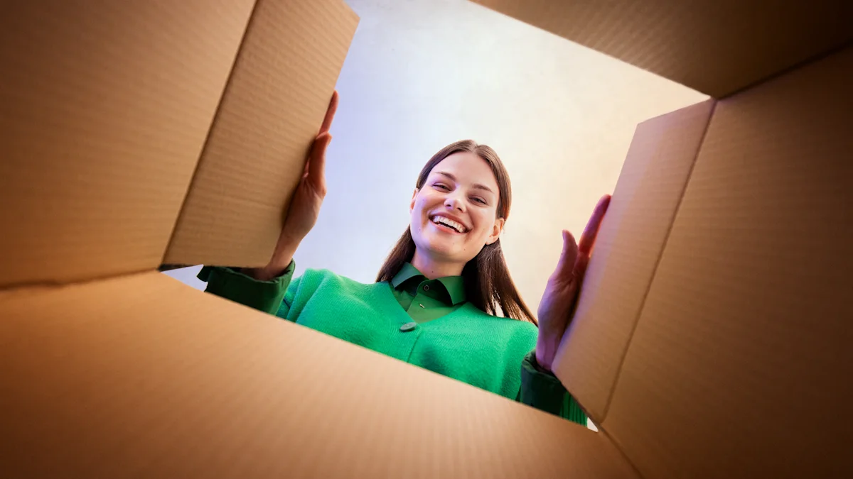 A woman looking into a cardboard box.
