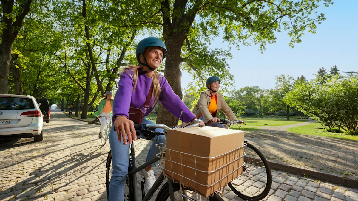 Two smiling people riding bicycles on a sunny day.