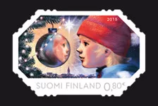 Kuvajainen-postimerkissä lapsi ihmettelee omaa kuvaansa, joka heijastuu peilin lailla joulupallosta. 