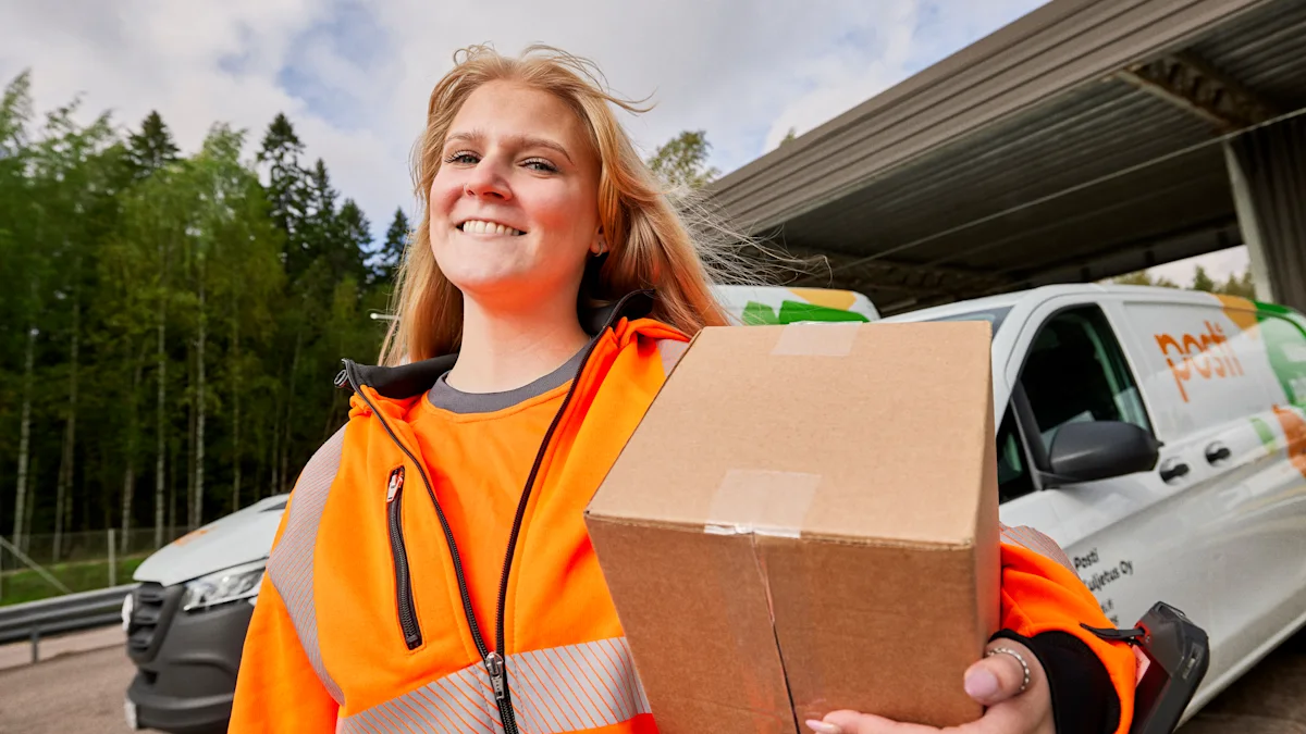 A woman carrying a parcel.