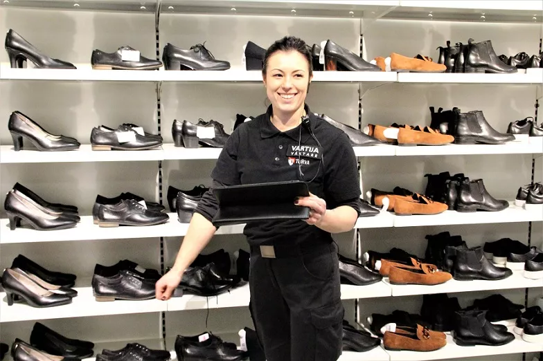 A guard in a shoe shop.