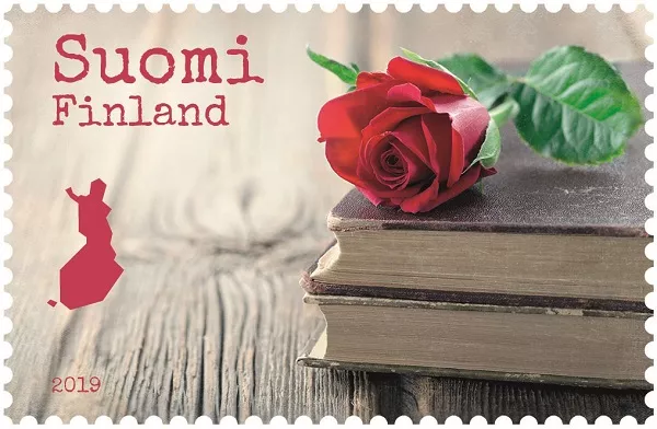 A red rose in a stamp.