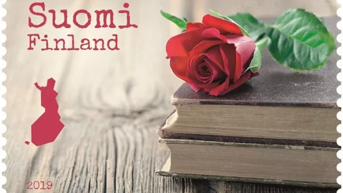 A red rose in a stamp.