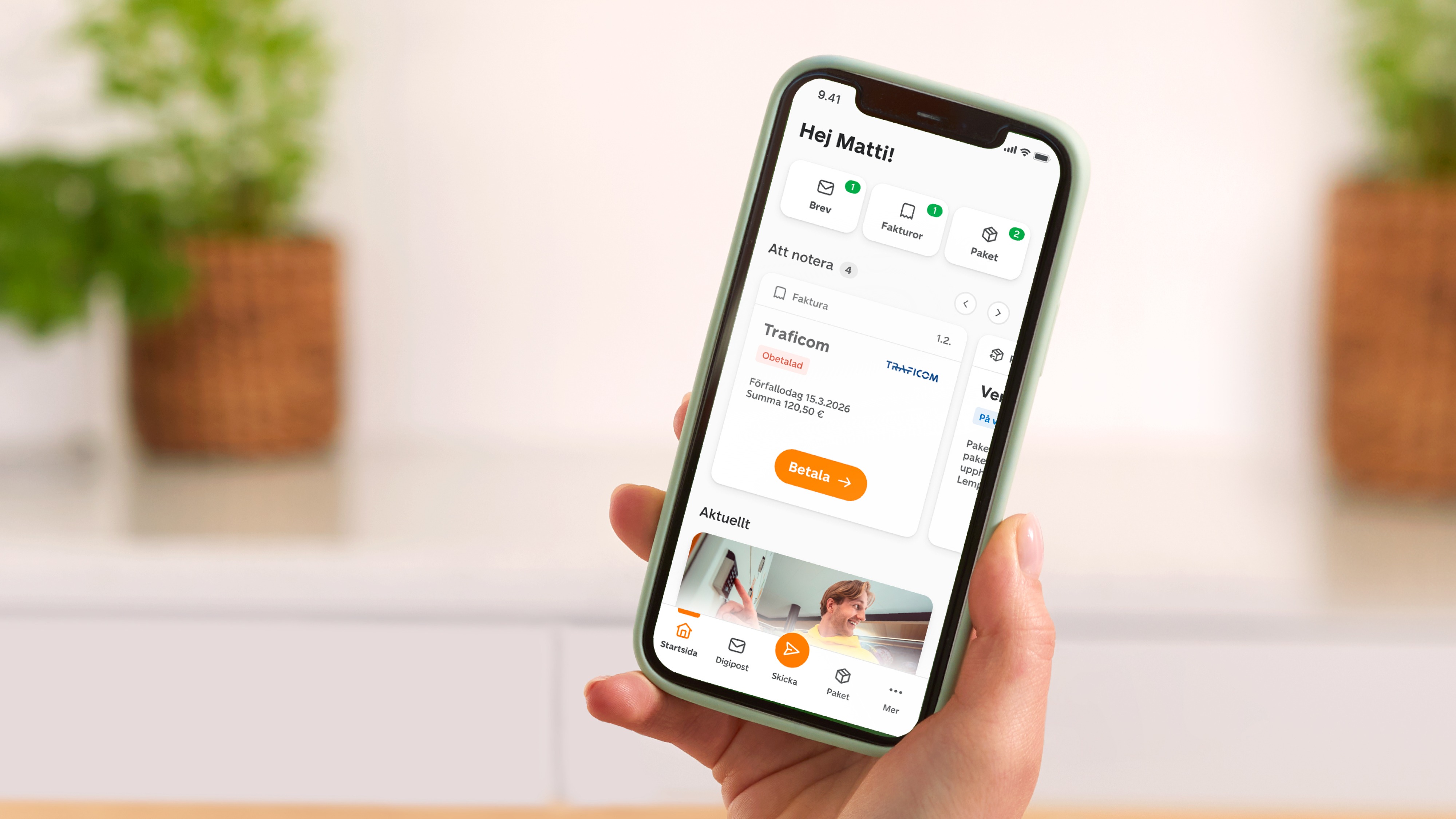 Med telefonen i handen