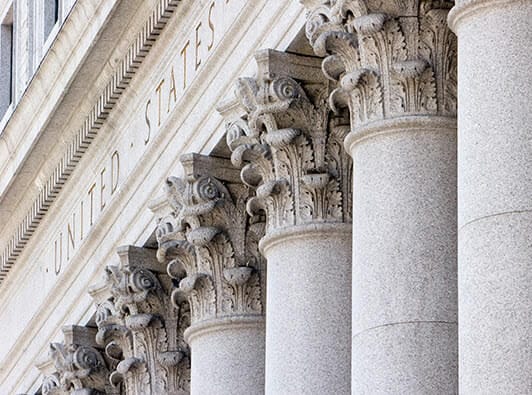 close-up of columns on front of U.S. court building