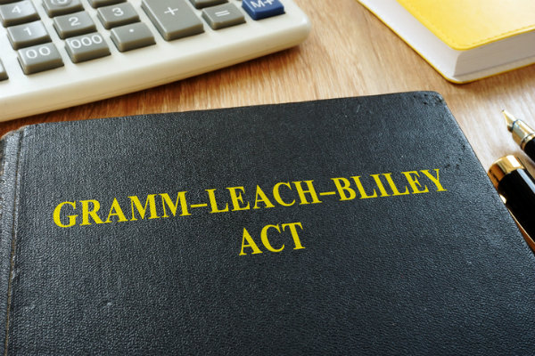 A book titled "Gramm-Leach-Bliley Act"