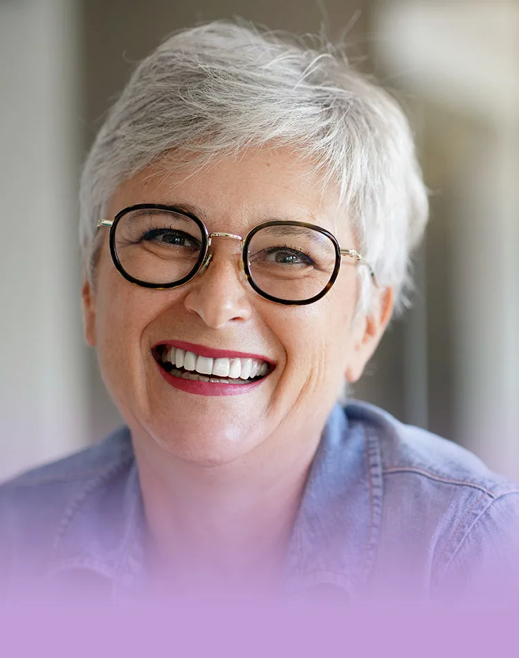 Smiling middle-aged woman with glasses