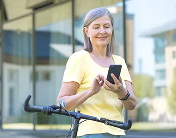 Middle-aged woman with a phone in her hand