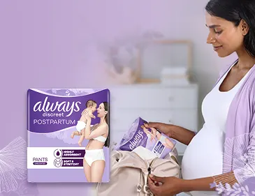 Pregnant woman preparing her hospital bag for delivery
