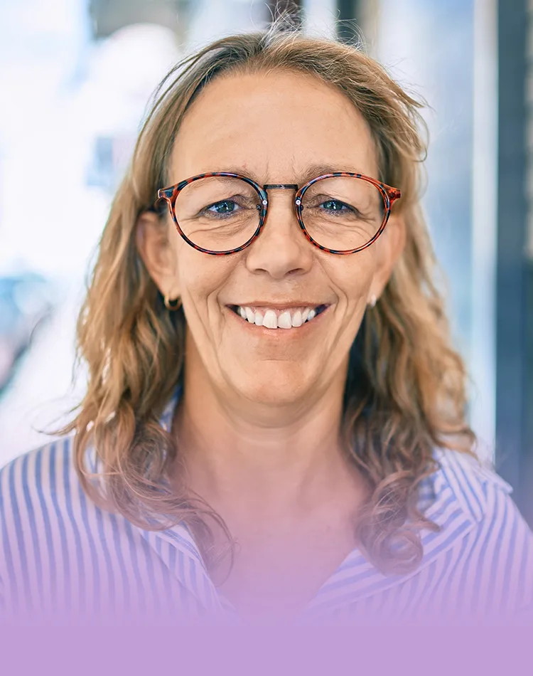 Smiling middle-aged woman with glasses