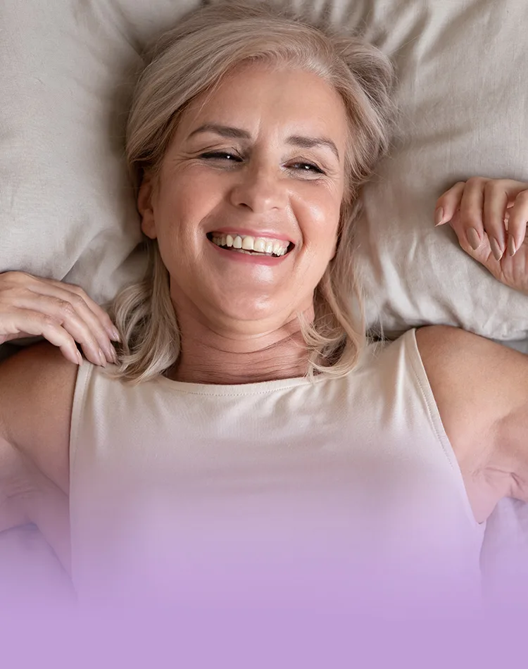 Lying smiling middle-aged woman