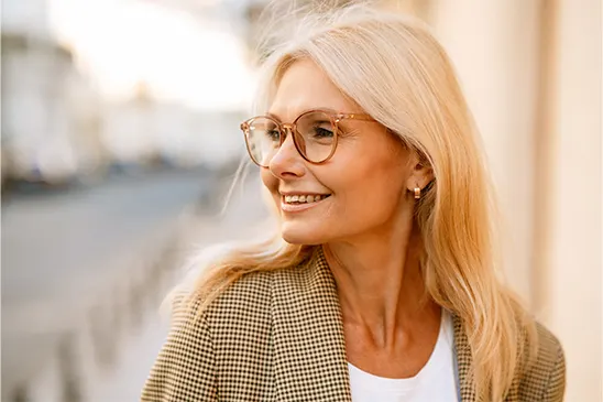 Smiling middle-aged woman with glasses