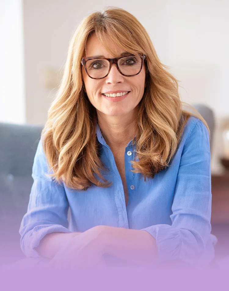 Brown haired middle aged woman with the glasses