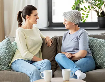 Two women talking about urinary incontinence
