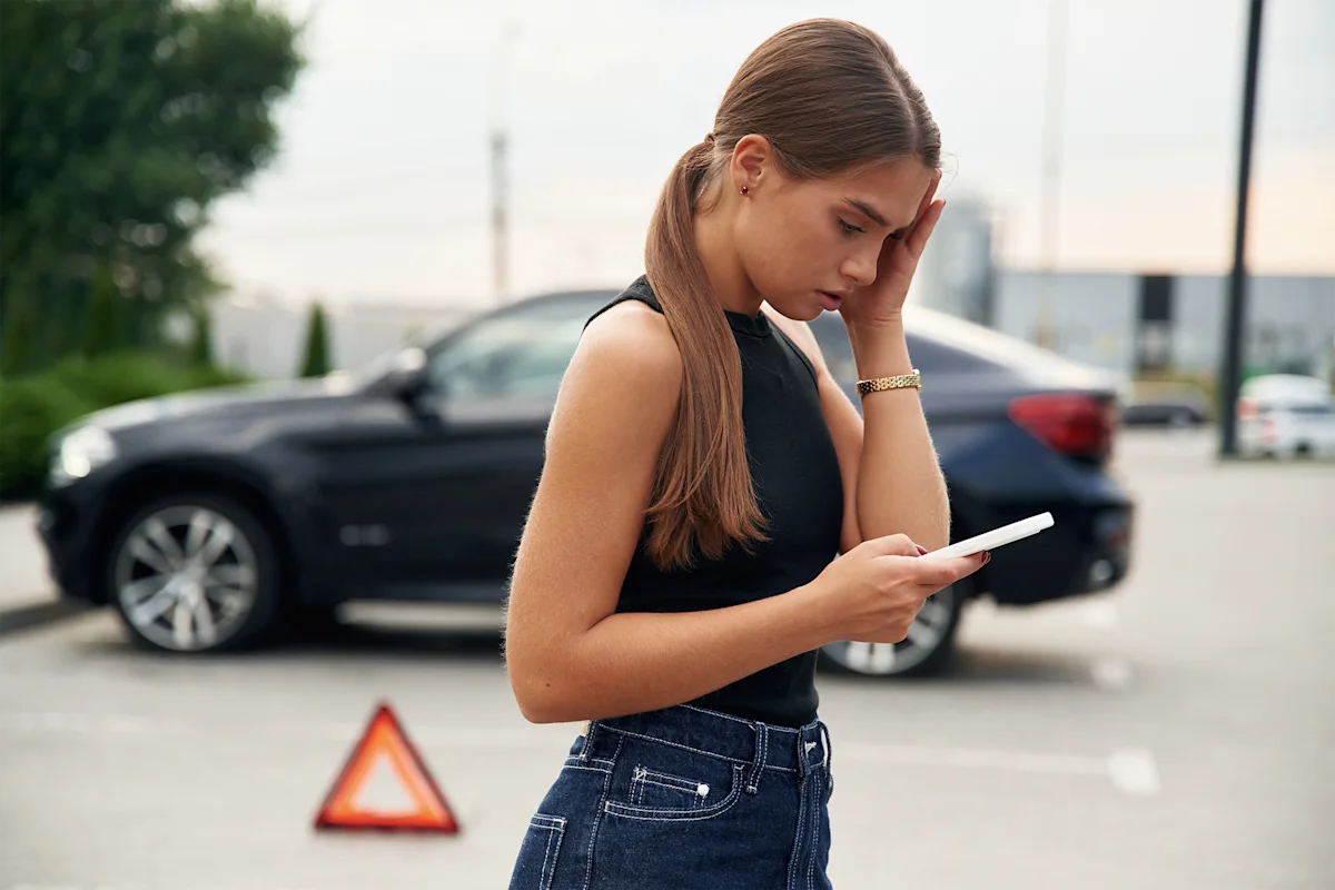 Worried driver after a car accident – Beware of car insurance scams