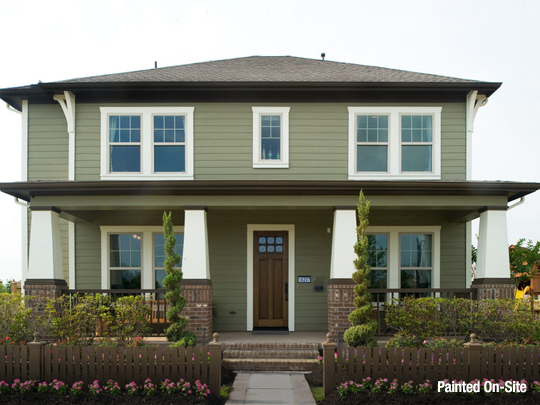 green house with white trim