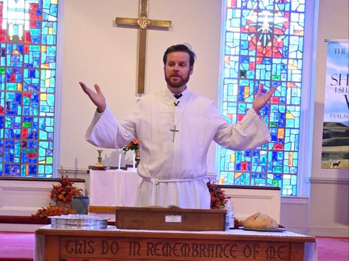 Scott Taylor with Eucharist