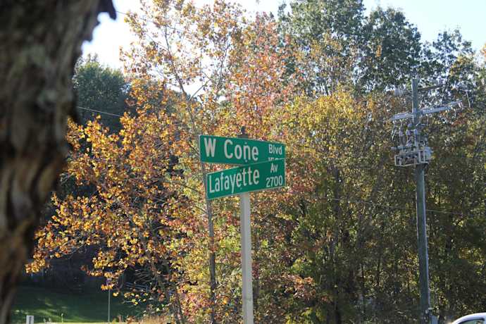 Cone and Lafayette street signs
