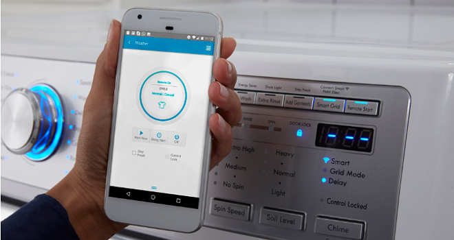 Image of using a smart phone with a smart washer