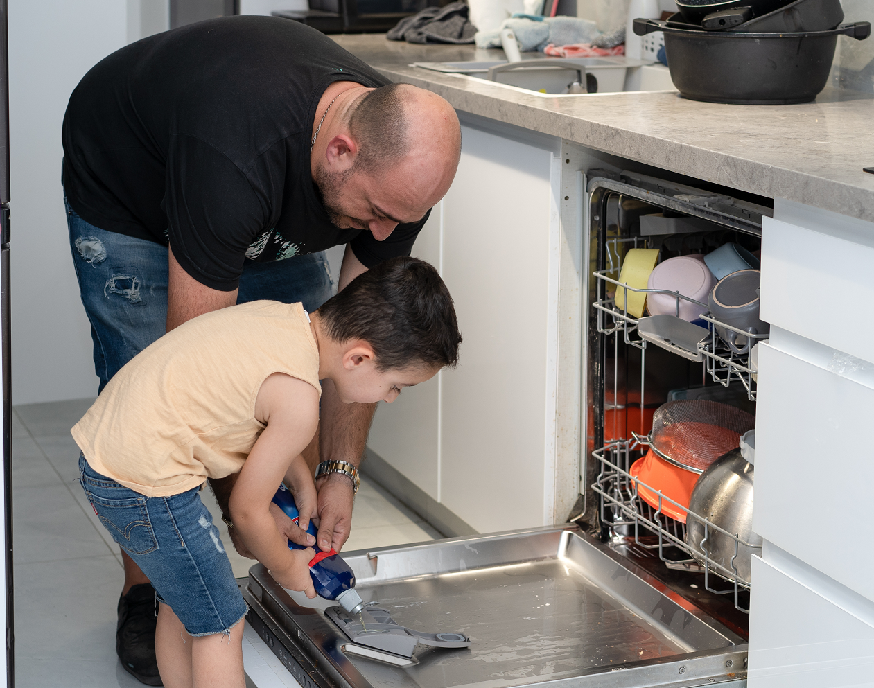 filling-the-dishwasher-rinse-aid-dispenser-image