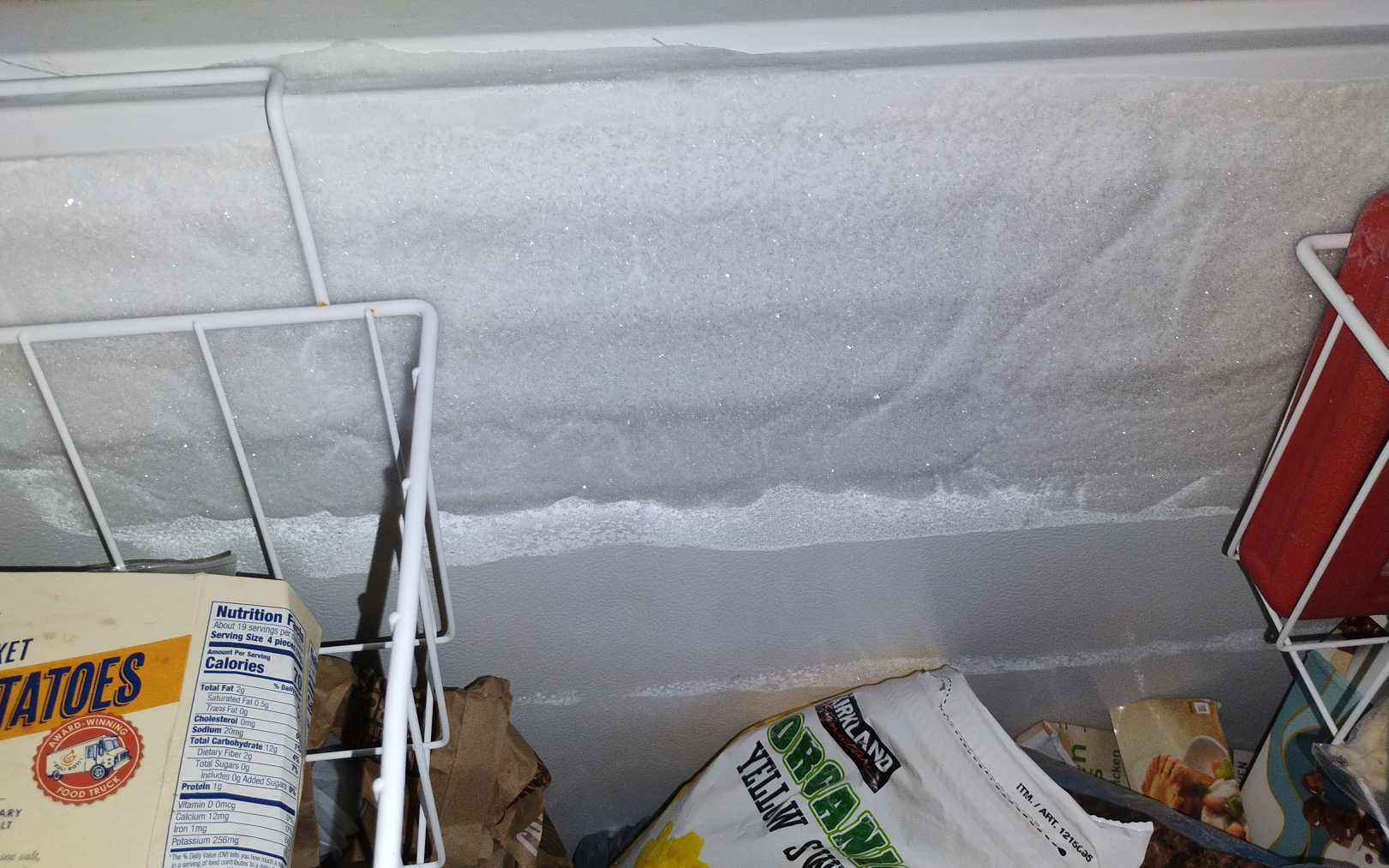 frost-builup-at-the-top-of-a-chest-freezer