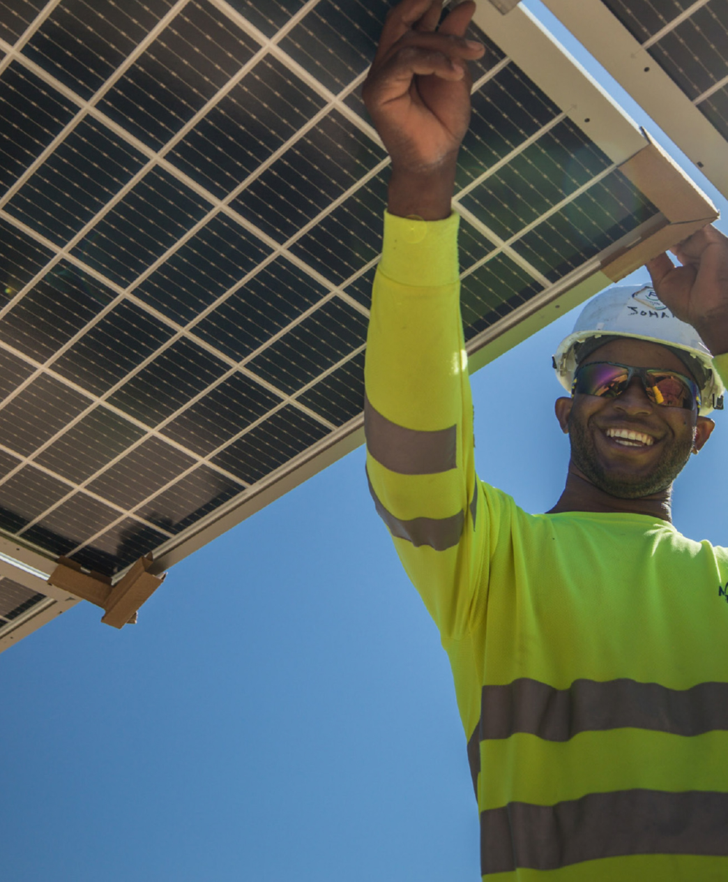 man-working-on-solar-panel-desktop.jpg