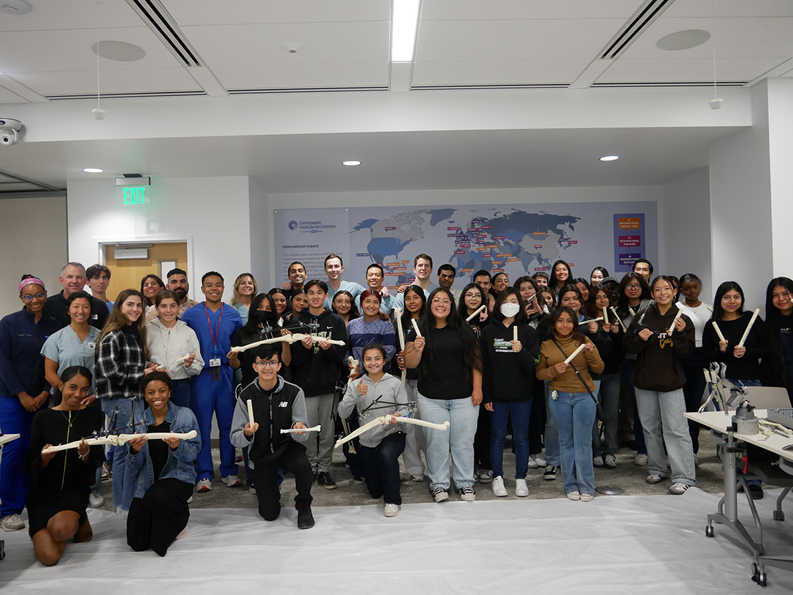 Story 9 Sawbones Workshop Group Photo of High School Students and UCLA Health.JPG