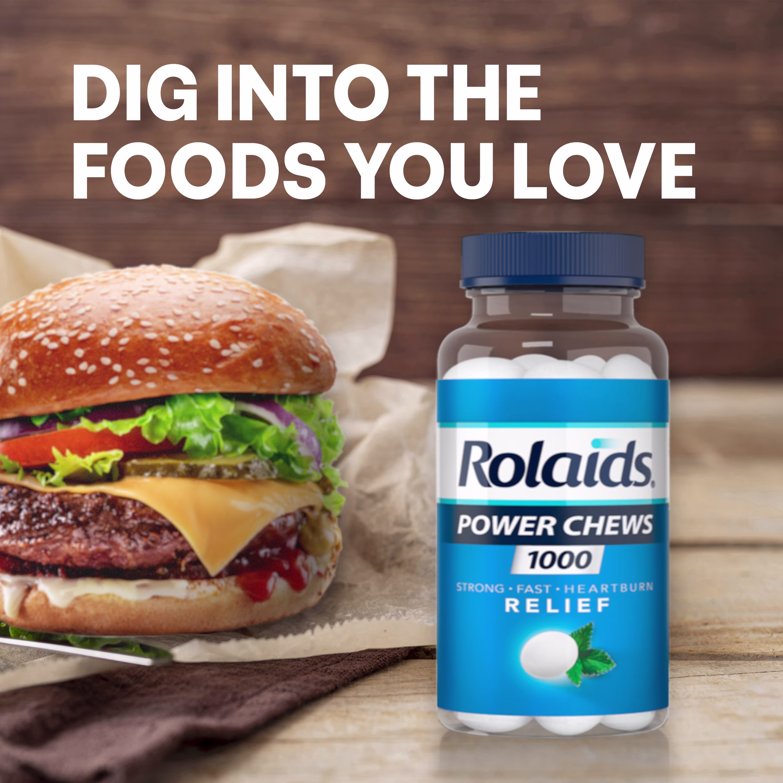 A bottle of Rolaids Power Chews Mint next to a cheeseburger, with text reading "Dig Into The Foods You Love."
