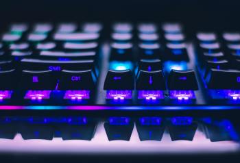 Close-up photo of an illuminated keyboard.