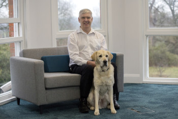 Pete Osborne, Guide Dogs' Chief Operations Officer, with his guide dog, Nyle.