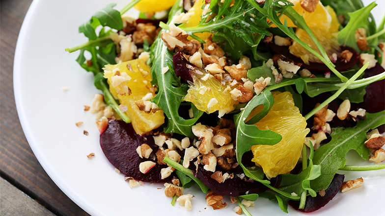 A healthy citrus salad on a plate