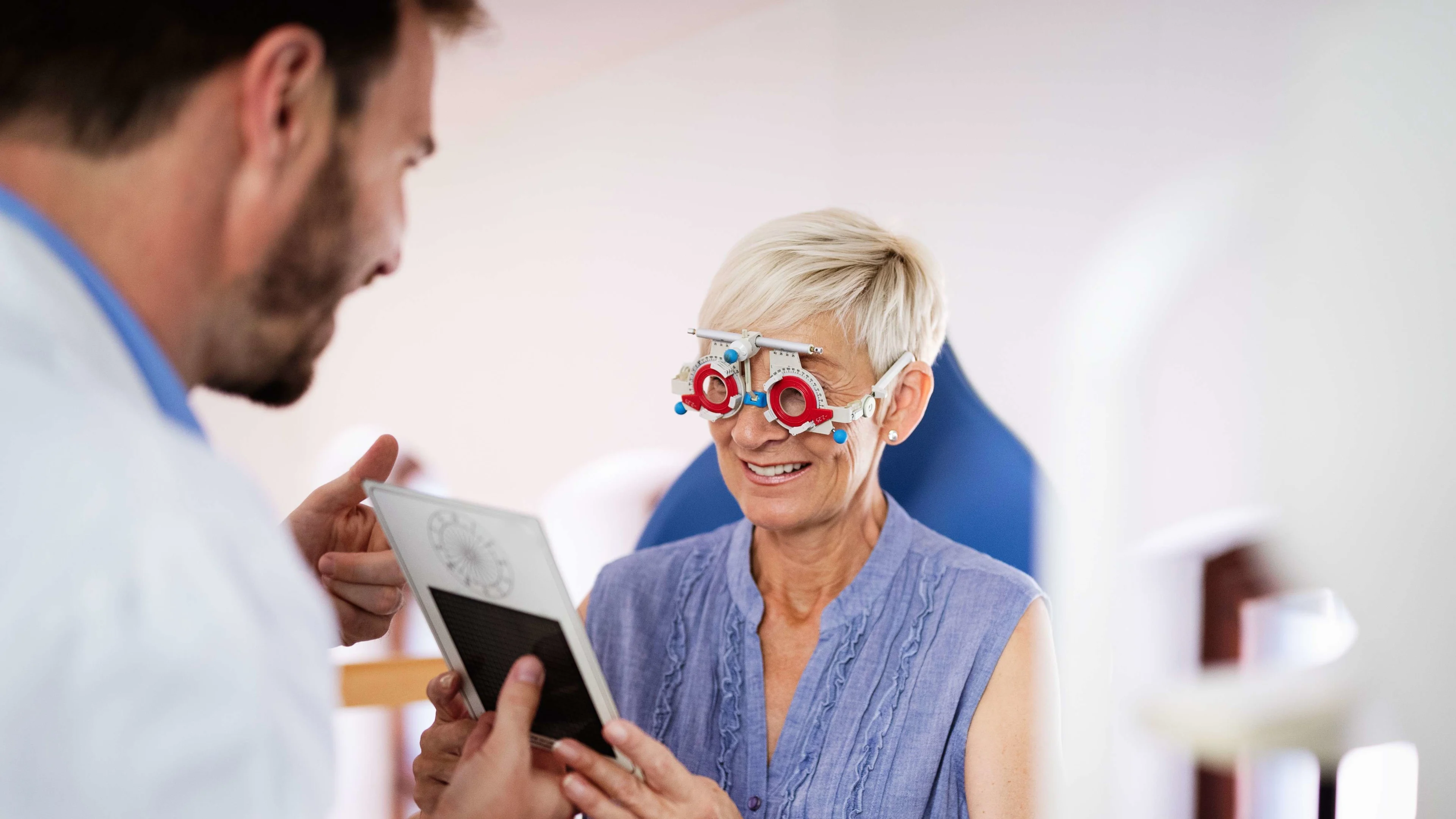 A woman having an eye test with an ophthalmologist