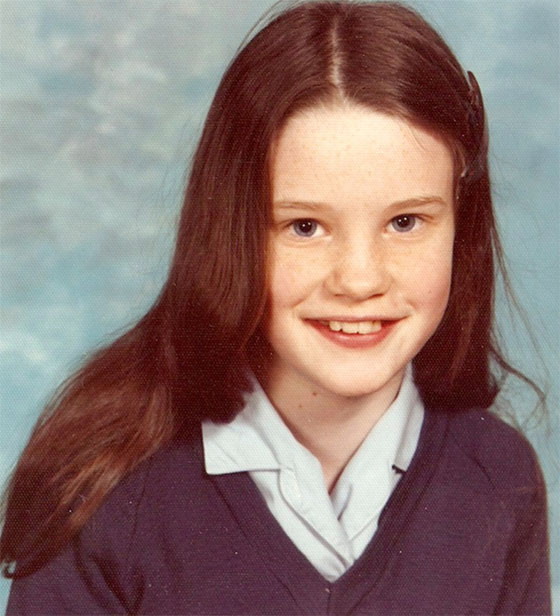 Susie Dent smiling as a child