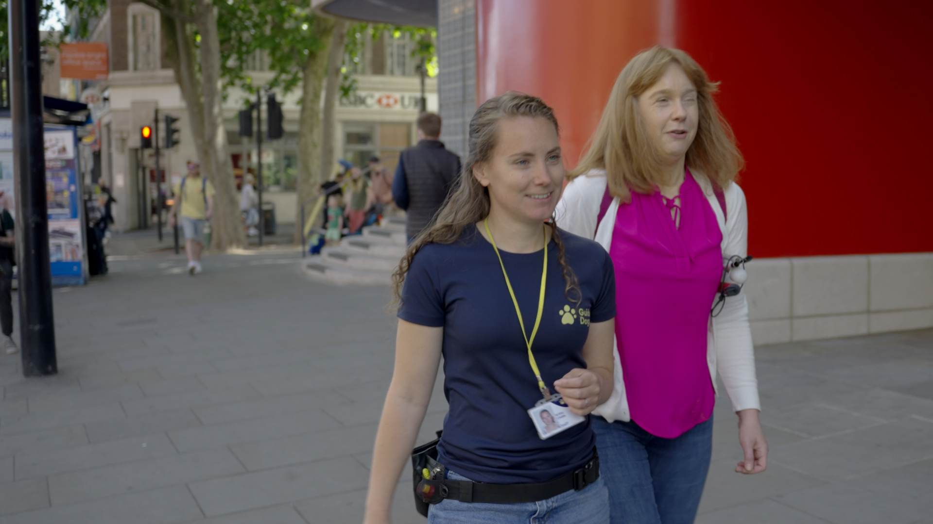 Kristy Childs walking down the street as a guide