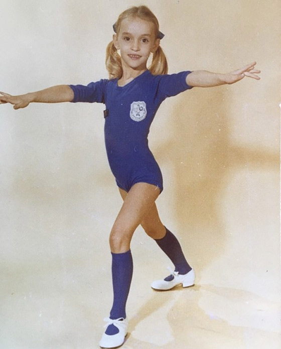 Michaela Strachan aged 8 in a dancing pose