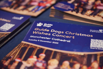 A close up of the Guide Dogs Christmas Wishes Concert programme