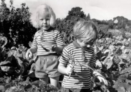 Deborah Meaden as a child in a field with another child