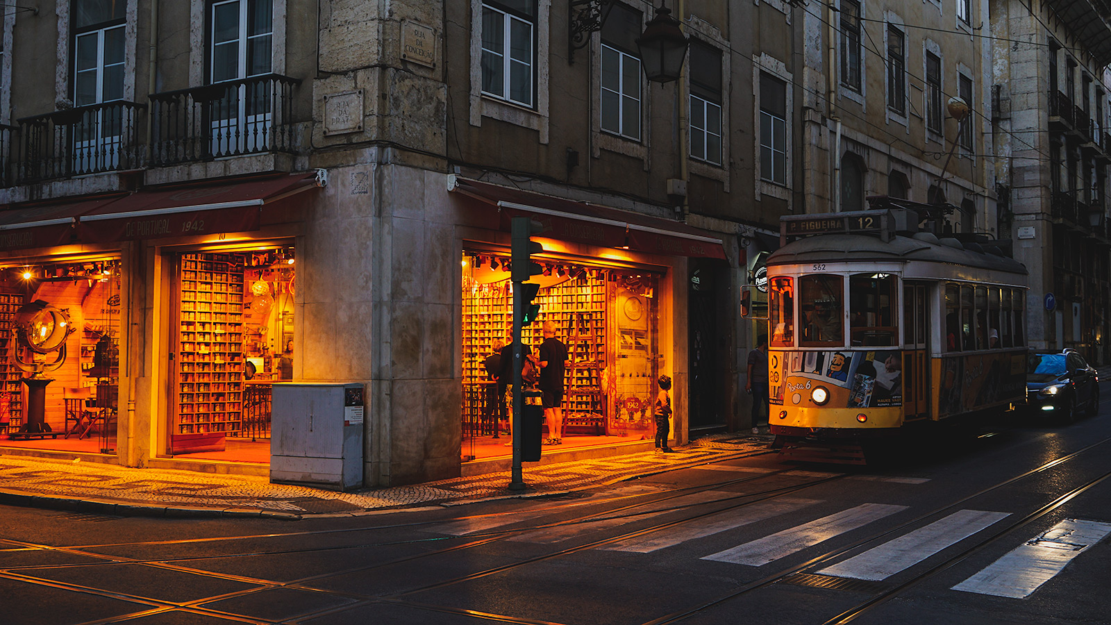 Tram 12 in front of the sardine store, Lisbon