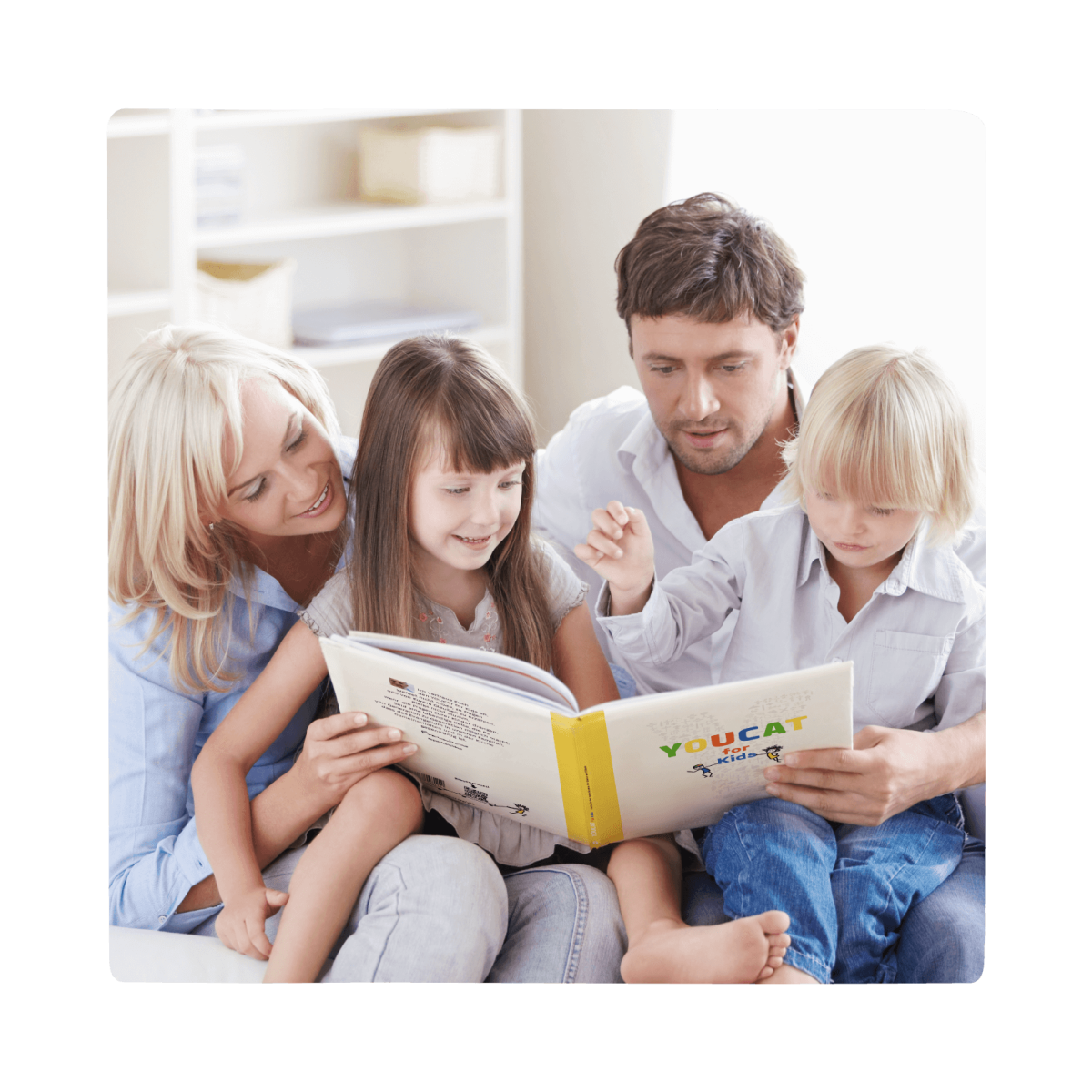 family of four reading the youcat for kids book