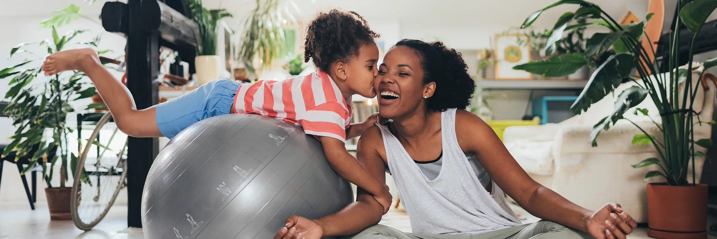 Mother and daughter exercise together