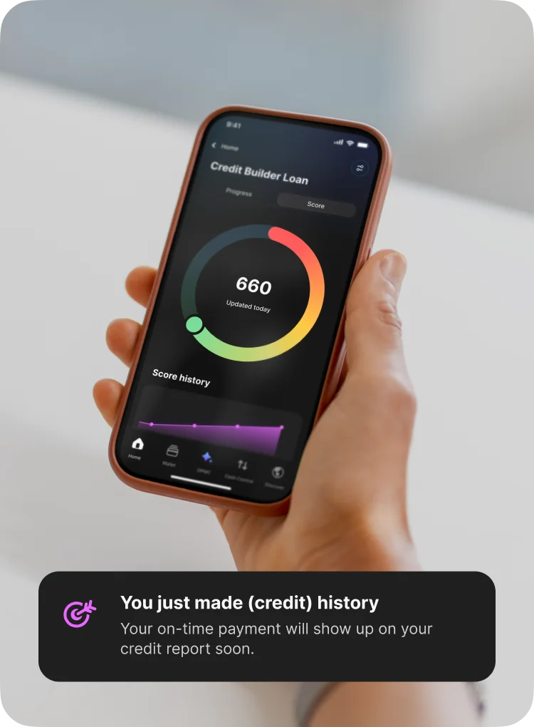 A customer holding a phone showing a Credit Builder Loan screen, with a credit score wheel showing a credit score of 660.