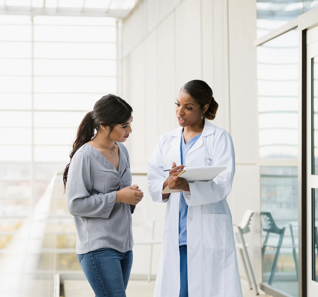 header-doctor-patient-walking-talking-d