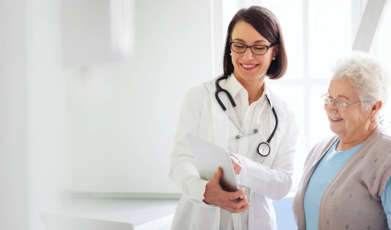 header-female-doctor-older-female-patient-t